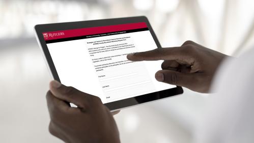 man-holding-white-screen-digital-tablet while filling out the STRIDE request form