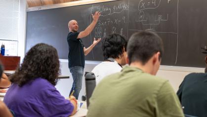 Alex Kontorovich teaching a group of students in the Math Corps program