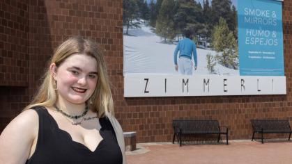Gabrielle Carmella, a senior attending the Mason Gross School of the Arts, helped Zimmerli Art Museum officials prepare for the "Smoke & Mirrors" exhibition. Jeff Arban/Rutgers University