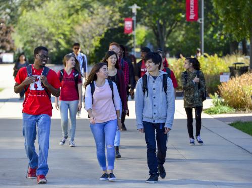Diverse students walking