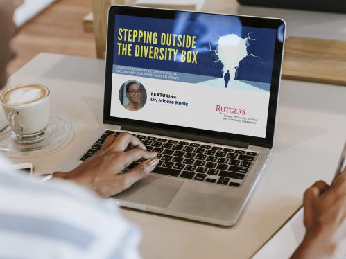 Black woman working on her laptop watching the video -Stepping outside the diversity box